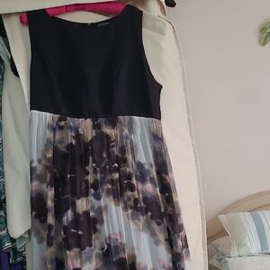 Sleeveless Black Bodice Midi Dress with Floral Pleated Skirt